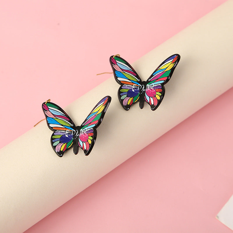 Pendientes estereoscópicos acrílicos de mariposa al por mayor pendientes coloridos